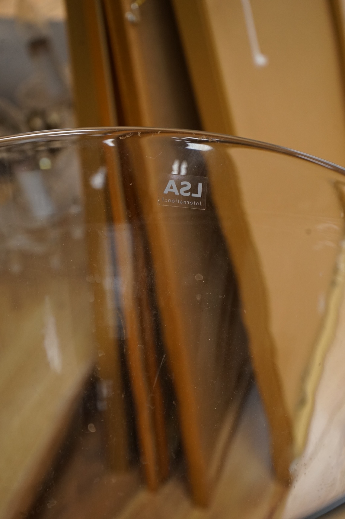 Three large glass vases, tallest 60.5cm